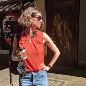 Bold Orange Sleeveless Blouse with Vegan Leather Collar Detail